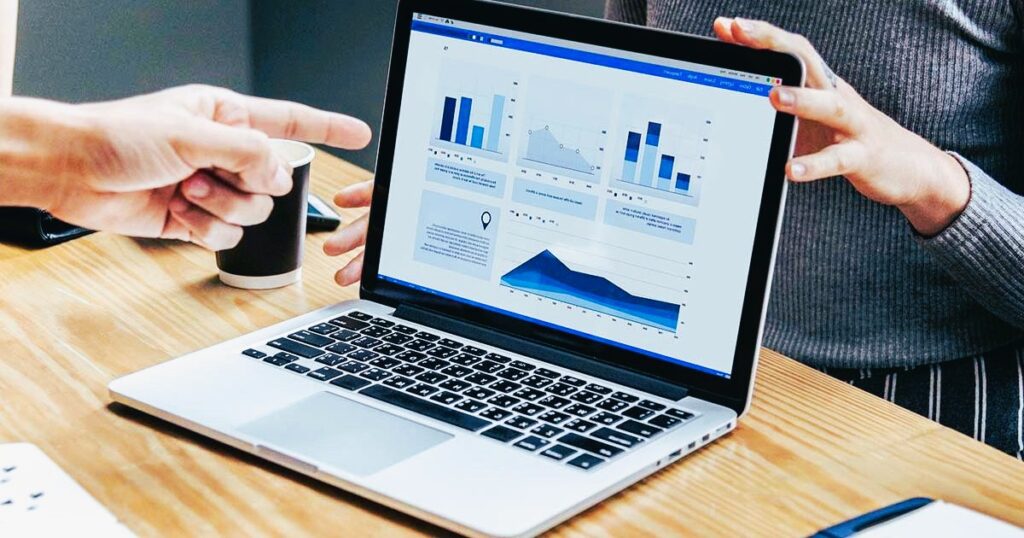 Graphs and data on a laptop